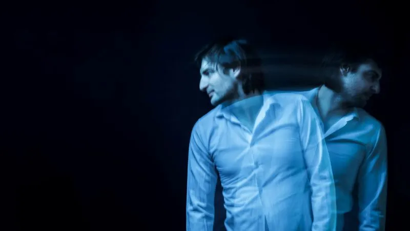 A person in a blurred motion, representing the emotional and mental turmoil often associated with mood disorders. The image captures the feeling of internal conflict, highlighting the need for effective mood disorders and treatment.