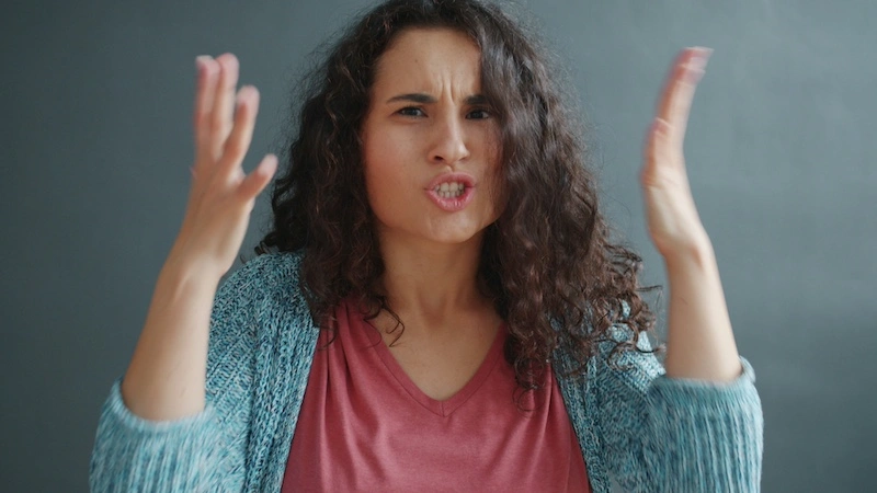 woman struggling from impulsive vs intrusive thoughts